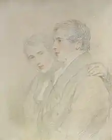 Mainly charcoal drawing, with some colour, of two young men; a little more than head and shoulders; the one on the left faces towards the viewer; the one on the right faces left. Both are clean shaven and wear what looks like great coats.