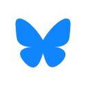 Logo showing a white butterfly in a blue sky.