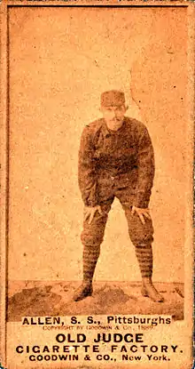 Sepia-tone baseball card of Bob Allen bent over, by the Old Judge Cigarette Factory