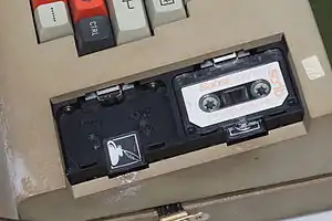 microcassette engaged in the rewind socket