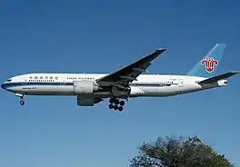 Boeing 777-200 from China Southern Airlines approaching Baiyun Airport in 2003. At that time, the airport was the most important hub of China Southern Airlines.