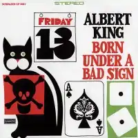 The album cover for Born Under a Bad Sign. The cover features a drawing of various objects related to superstition, including: a black cat, snake eyes, an ace of spades, and a calendar displaying the date Friday the 13th.