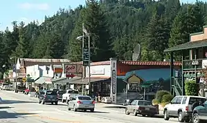 Looking north from Highway 9 at the Boulder Creek Hardware building and the 70-foot long painted mural by John Ton, depicting two phases of the community's history.