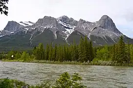 Ehagay Nakoda, with four named peaks: Ship's Prow (far left), Mount Lawrence Grassi (centre), Miners Peak (right), and Ha Ling Peak (far right)