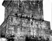 The base of the Obelisk in July 1913, with a Union Jack planted on it by loyalist militants