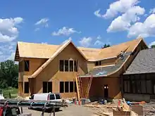 Constructing the library extension's wooden structure