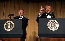 President George W. Bush (left) with Bush impersonator Steve Bridges in character (right) at the 2006 Dinner.