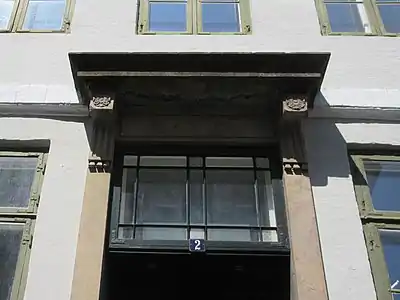 Detail of the transom window above the main entrance.