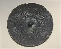 Early mirror, Qijia culture, before c. 1800 BCE