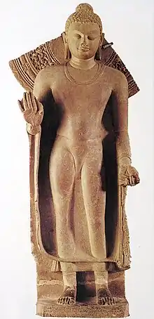 Buddha, standing, inscribed: "Gift of Abhayamira in 154 GE" (474 CE) in the reign of Kumaragupta II. Sarnath Museum.