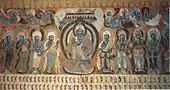 Buddha flanked by bodhisattvas with flying apsaras. Dunhuang mural. Cave 428, Northern Zhou dynasty