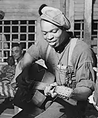 Image 21Buddy Moss in Georgia prison camp, 1941 (from List of blues musicians)