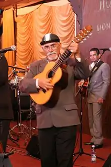 Felix Martinez of Grupo Compay Segundo with an armónico