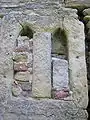 Staggered, high Gothic double window on the ground floor of the east wall of the palas