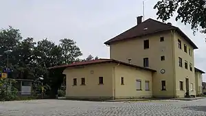 Three-story building with hipped roof