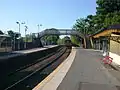 A terminating train from Glasgow Central leaves Platform 2