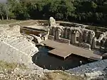 Ruins of an amphitheatre and other structures.