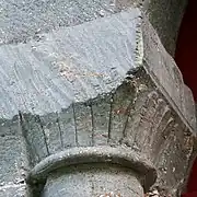 Exterior capital on a corner piller carving