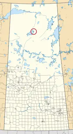 A map of the province of Saskatchewan showing 297 rural municipalities and hundreds of small Indian reserves. One is highlighted with a red circle.