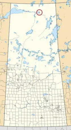 A map of the province of Saskatchewan showing 297 rural municipalities and hundreds of small Indian reserves. One is highlighted with a red circle.