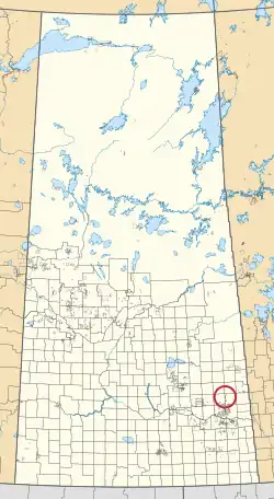 A map of the province of Saskatchewan showing 297 rural municipalities and hundreds of small Indian reserves. One is highlighted with a red circle.