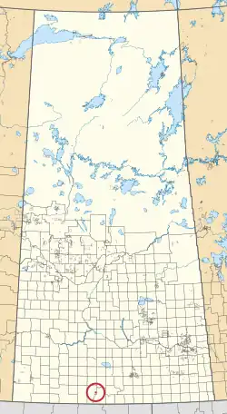 A map of the province of Saskatchewan showing 297 rural municipalities and hundreds of small Indian reserves. One is highlighted with a red circle.