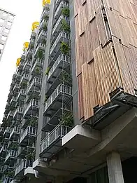 Council House 2. Little Collins Street, Melbourne.  Completed 2006.  World's first 6 star green rating building features louvered facade, natural and recycled materials, solar panels and thermal mass cooling.