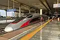 A CR400AF-B EMU on G14 train stops at Platform 6 of Nanjing South