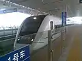 CRH1 train arriving at Haikou East Station.