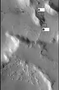 CTX context image showing location of next HiRISE image (letter A box). Location is Ismenius Lacus quadrangle.