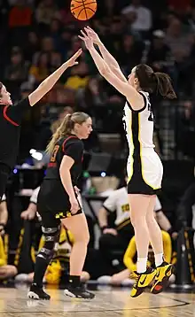 Clark shooting a three-pointer at the Big Ten tournament