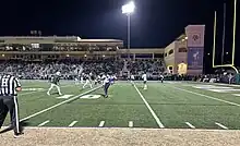 Cal Poly's offense prepares to snap the ball against the Northern Colorado defense during a 2023 Big Sky Conference home victory.