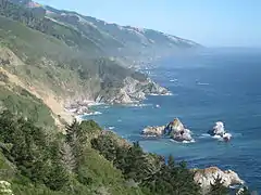 Big Sur - Midcounty coastline with the McWay Rocks in foreground