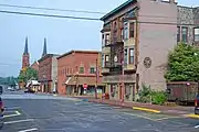 Oak Street at Sixth (north side), looking west