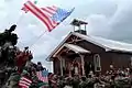 Chapel at Camp Bondsteel in Kosovo, during Presidential visit. Makeshift crosses later erected on chapel grounds were removed.