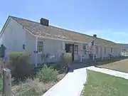 The main Administration Building of Fort Verde was built in 1871 and is located at 125 E. Hollamon St. It contained the main offices from which the decisions as to the operations of the fort were made. It now houses the Visitor Center of the Fort Verde Museum and contains exhibits, period artifacts from military life, and history on the Indian Scouts and Indian Wars era. It is listed in the National Register of Historic Places, reference #71000120.