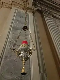 Candel-holder in the right chapel if the Church of St. Peter and Paul, Arese