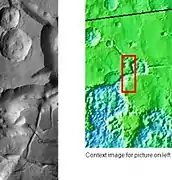 Wide view of huge canyons in Aureum Chaos, as seen by THEMIS.  Gullies are rare at this latitude.  Image from Margaritifer Sinus quadrangle.