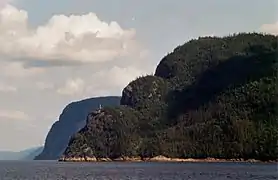 Cap Éternité in the background, and the three levels of Cap Trinité in the foreground