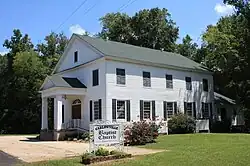 The Carlowville Baptist Church, established in 1837 and added to the National Register of Historic Places on January 18, 1978 as a contributing property to the Carlowville Historic District.