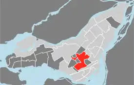 Location of Côte-des-Neiges–Notre-Dame-de-Grâce on the Island of Montreal.  (Grey areas indicate demerged municipalities).