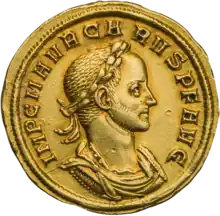 Golden coin depicting Carus