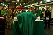 U.S. Navy Chaplain Father Kenneth Medve offers Catholic Mass on board the USS Ronald Reagan.