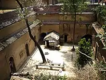 Sunken courtyard in a cave dwelling in Shaanxi, China