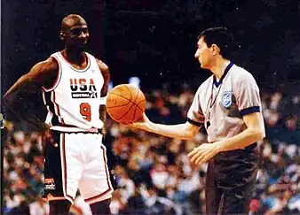 Jordan receiving a ball from a referee