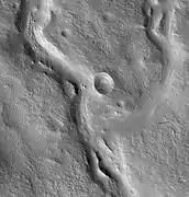 Valleys on the Ejecta Blanket from Cerulli Crater, as seen by HiRISE.