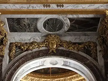 Baroque mascaron in the Hall of Mirrors, Palace of Versailles, designed by Jules Hardouin-Mansart, 1678-1684