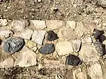 Stone wall of pueblo