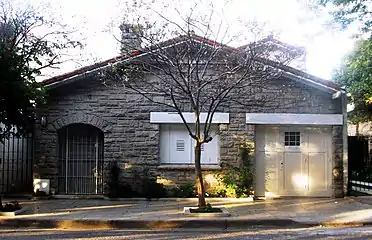 A facade resembling those of the Basque traditional houses, with a two-sided roof