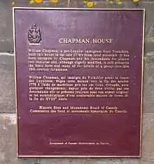 A photo of the plaque near Chapman House designating it as a Historic Site.